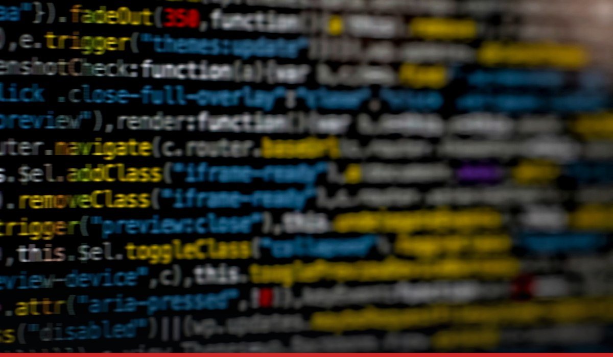 Binary code on screen — enterprise security patches